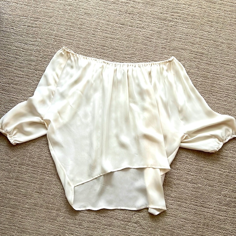 Adorable off shoulder ivory Joie silk blouse.